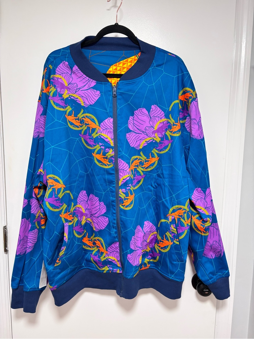 Reversible Marvel Blue Bomber Jacket with Purple Floral and Orange Chain Details
